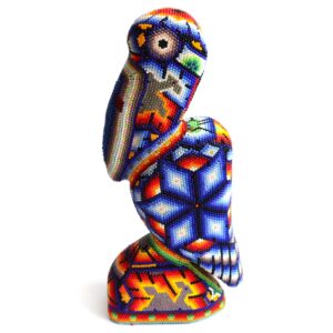 Pélican doublé de perles