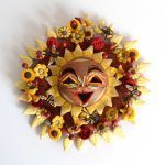 Polychrome clay sun