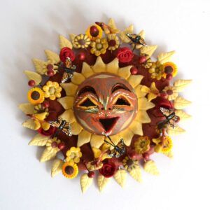 Soleil en faïence polychrome