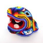 Cabeça de jaguar com arte Huichol