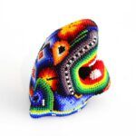 Tête de jaguar avec art Huichol