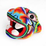 Cabeza de jaguar de arte huichol